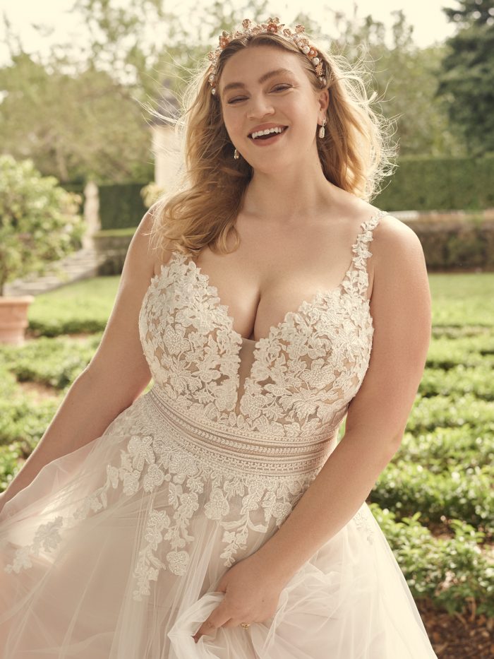 Bride Wearing Wedding Dress For Apple Shaped Plus Size Brides Called Ohara by Maggie Sottero