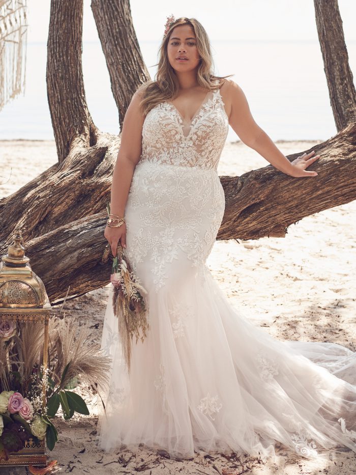 Bride Wearing Plus-Size Sparkly V-neck Mermaid Wedding Dress Called Faustine by Rebecca Ingram