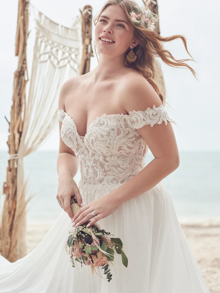 Bride Wearing Off-the-Shoulder A-line Wedding Dress for Petite Body Shapes Called Heather by Rebecca Ingram