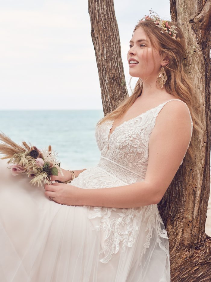 Bride on Beach Wearing Boho A-line Wedding Dress Called Isabella by Rebecca Ingram