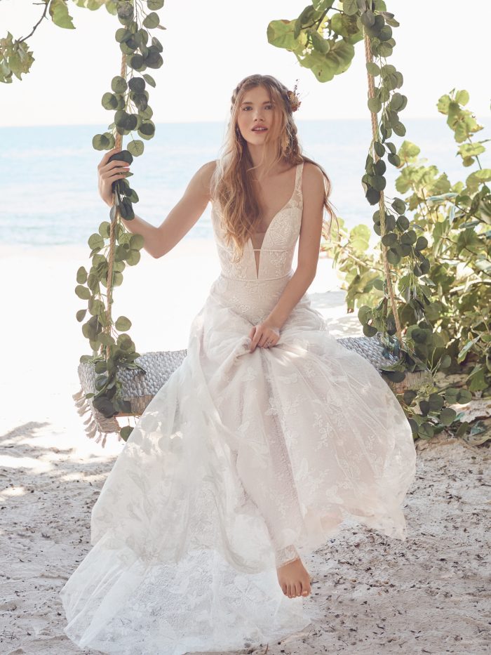 Bride on Swing Wearing Butterfly Lace A-line Bridal Gown Called Rubena by Rebecca Ingram