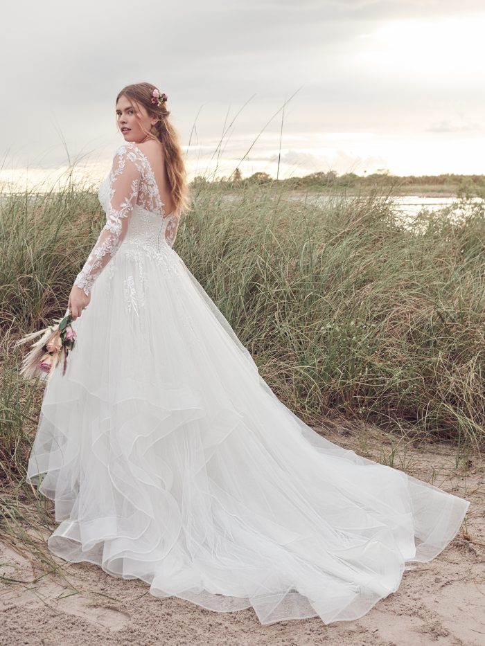 Bride Wearing Romantic Long Sleeve Ball Gown Wedding Dress Called Tessa by Rebecca Ingram