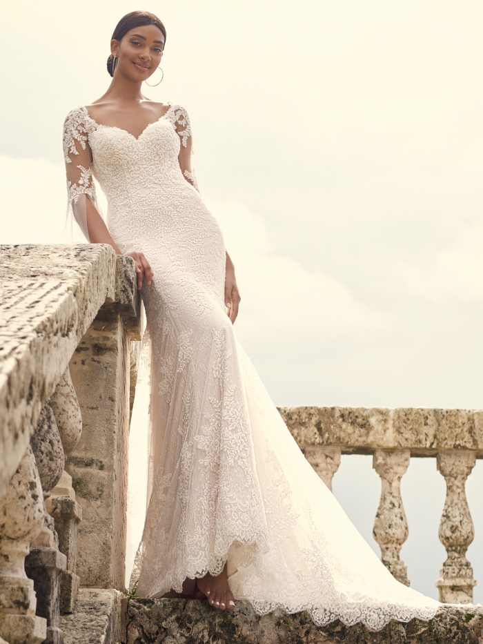 Bride Wearing Sheath Wedding Gown with Quarter-Length Bell Sleeves Called Dublin by Sottero and Midgley