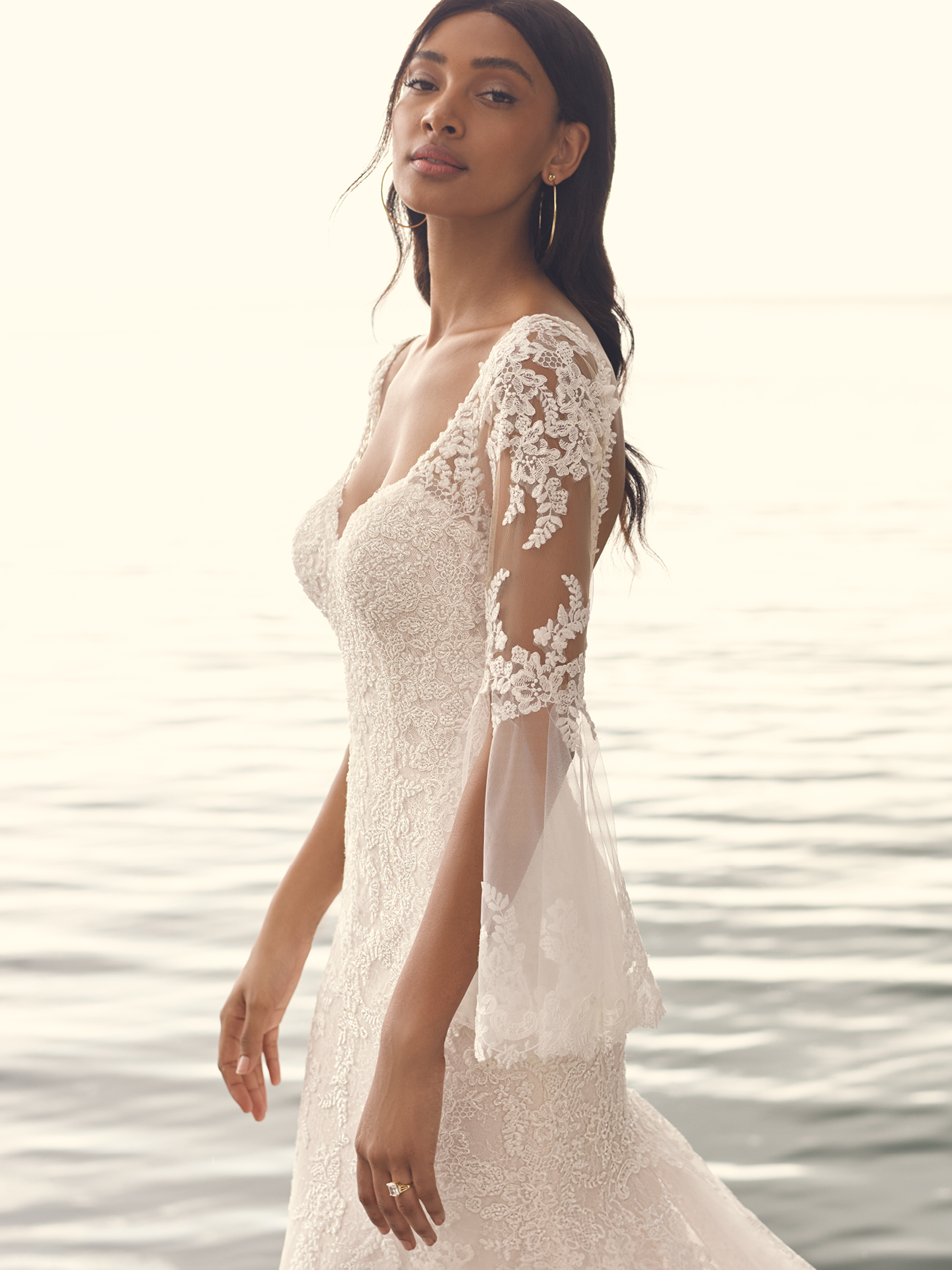 Bride Wearing Sheath Wedding Gown with Quarter-Length Bell Sleeves Called Dublin by Sottero and Midgley