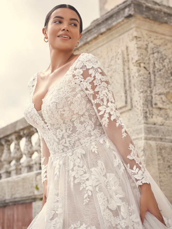 Bride Wearing Lace Long Sleeve Wedding Dress Called Valona by Sottero and Midgley