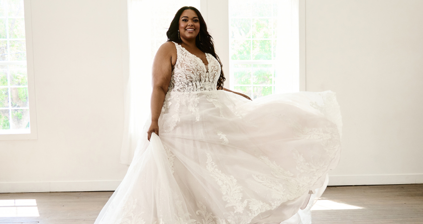 Body positive bride wearing Maggie Sottero wedding gown