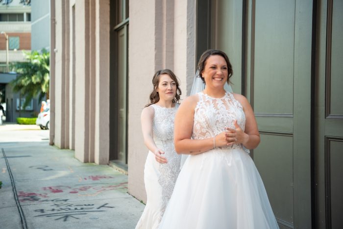 LGBTQ Brides Surprising Each Other During First Look While Wearing Maggie Sottero Wedding Dresses