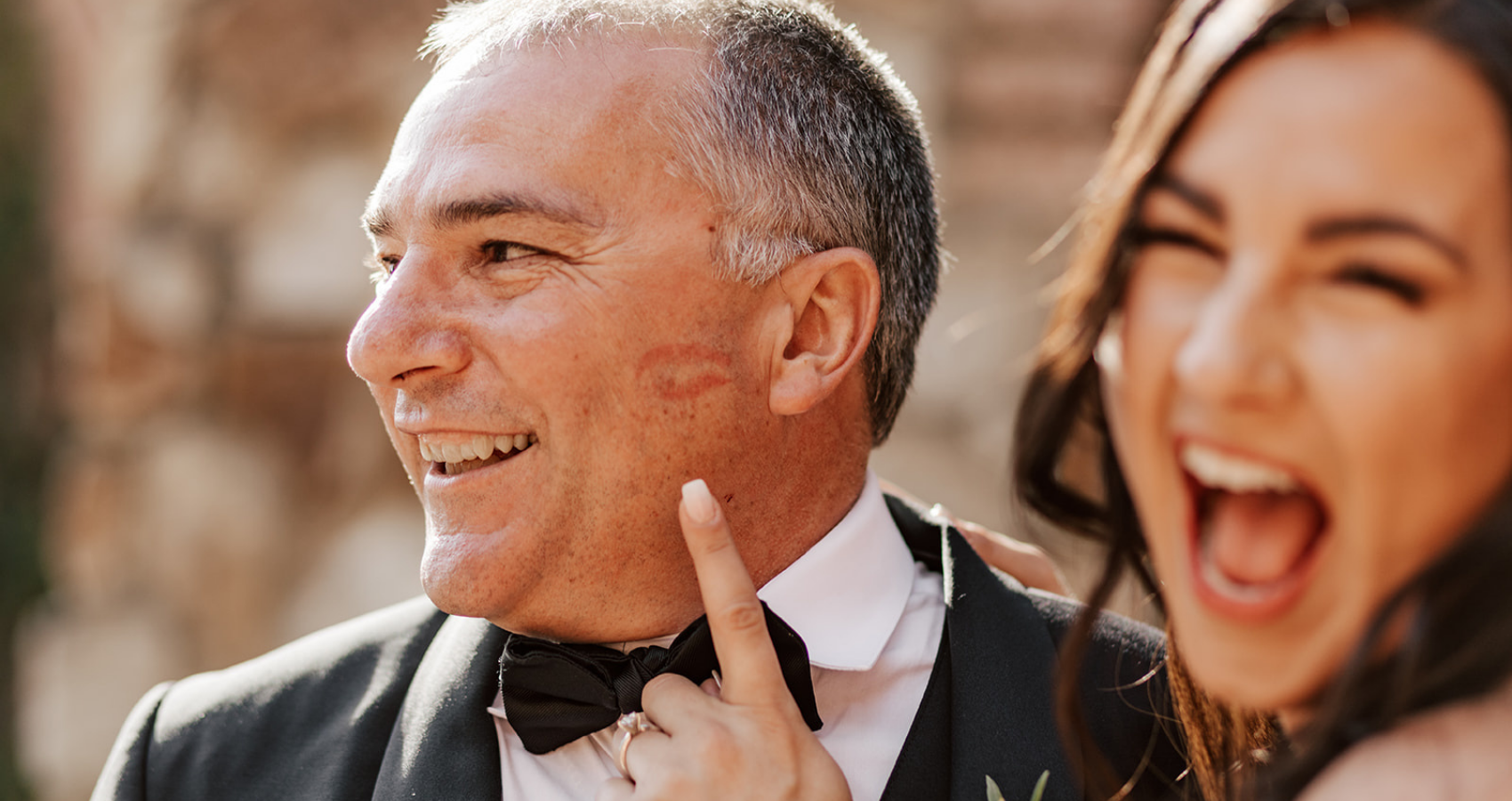 Bride With Father Of The Bride With Kiss Mark On Cheek