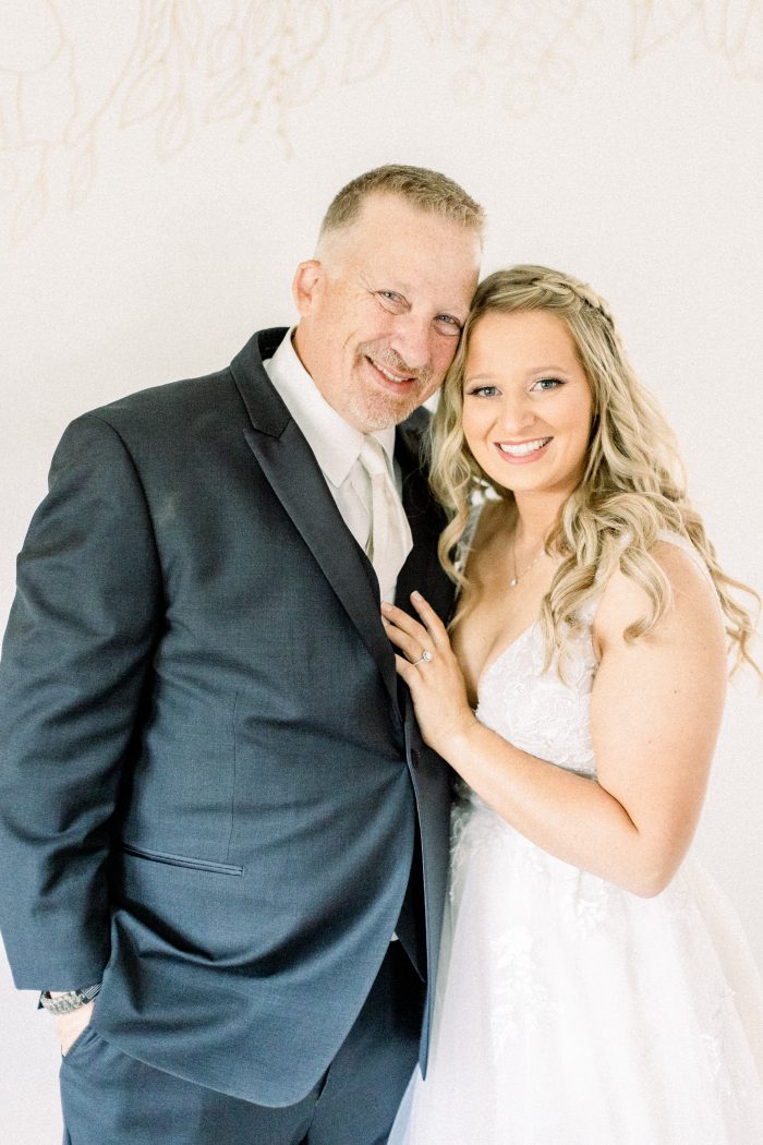 Bride In Floral V-Neck Wedding Dress Called Raelynn With Father