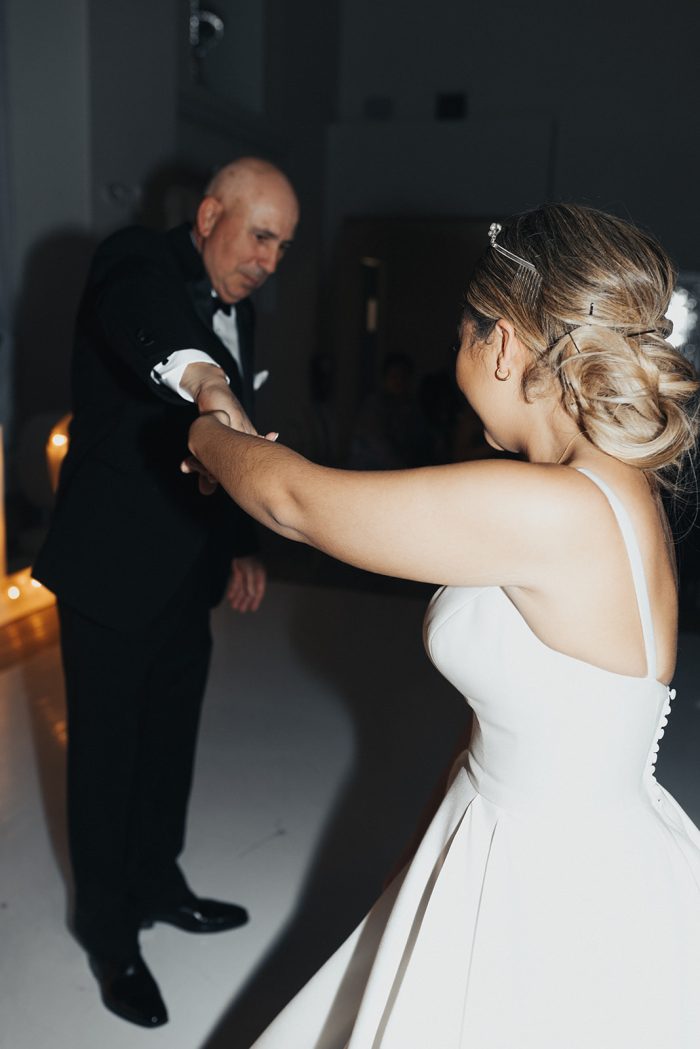 Bride In Modern Wedding Dress Called Selena By Rebecca Ingram Dancing With Father