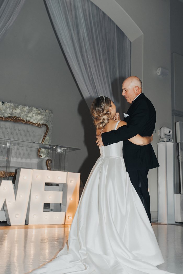 Bride In Modern Wedding Dress Called Selena By Rebecca Ingram Dancing With Father