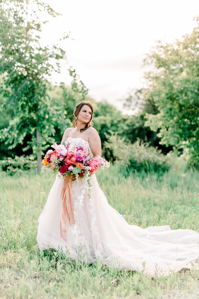 Real Bride Wearing Floral Cottagecore Wedding Dress in the Forest Called Zareen by Maggie Sottero