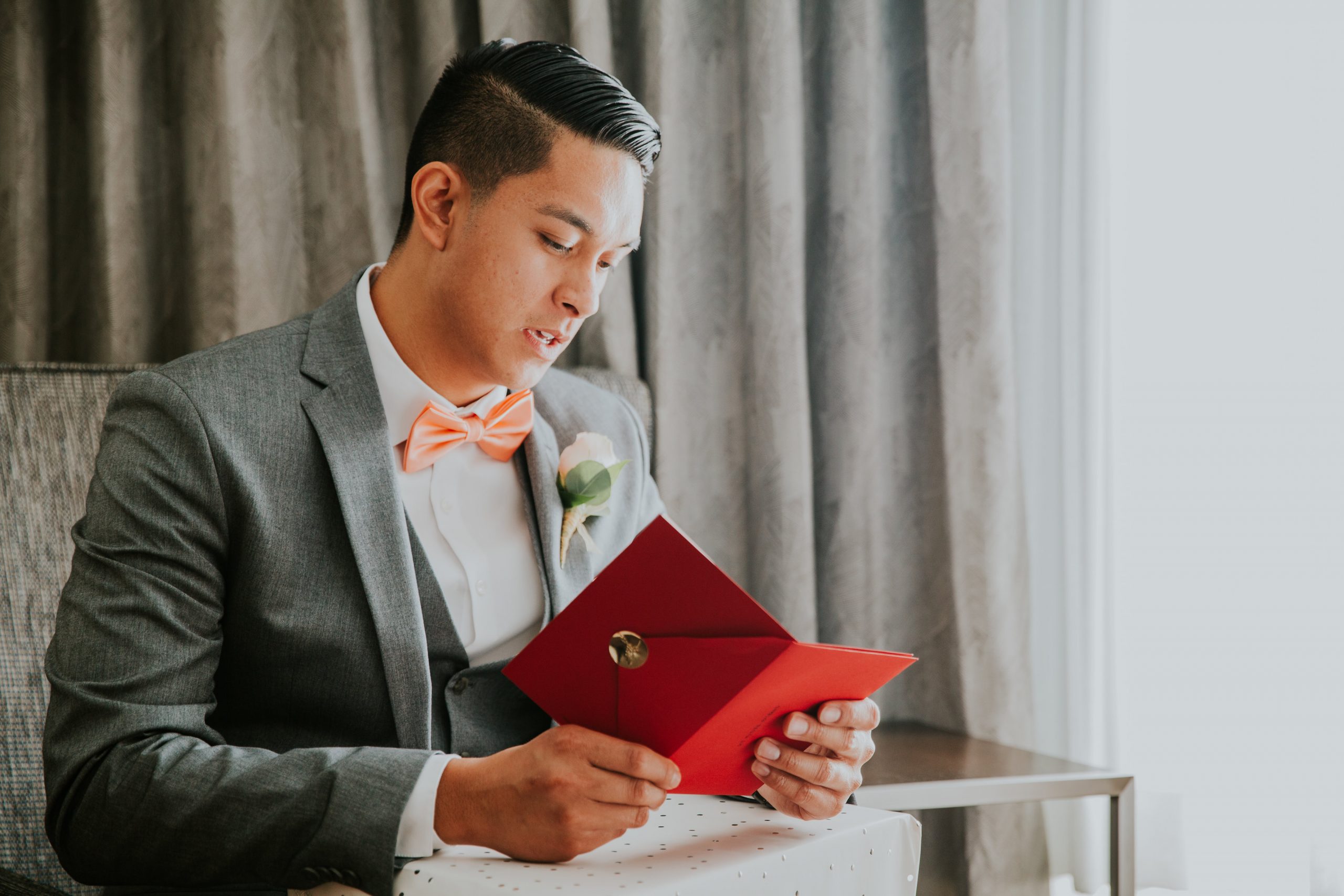 Groom Opening Pre-Wedding Gift That's One of Our Wedding Gift Ideas for Grooms