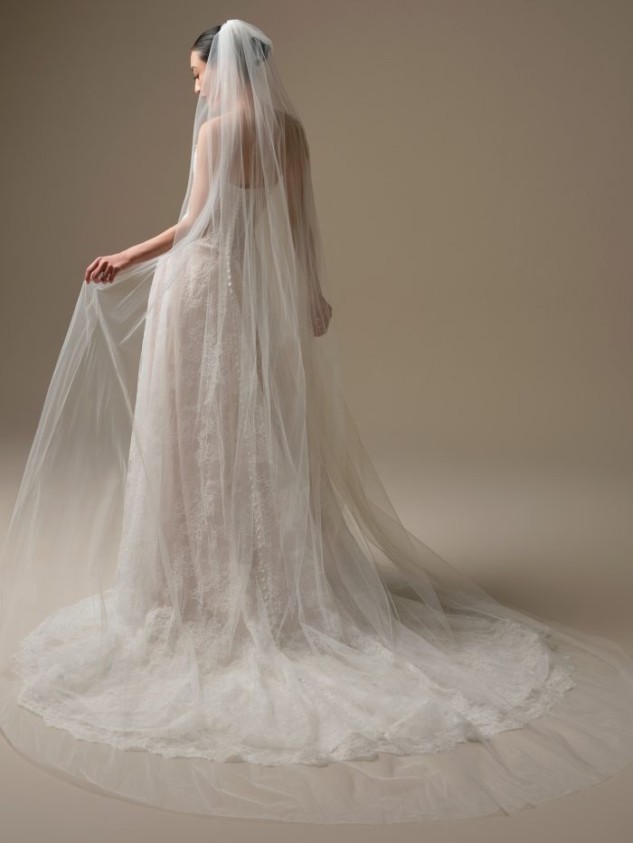 Maggie Sottero Essentials Edit cathedral veil paired with a strapless lace wedding dress, back view