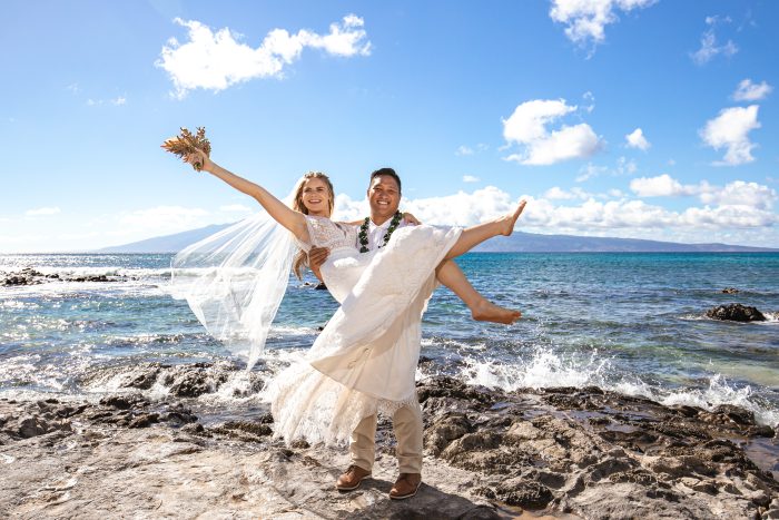 Groom Holding Bride Wearing Casual Beach Wedding Dress