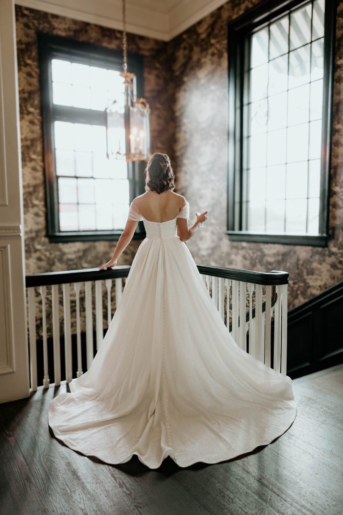 Bride wearing Anniston Marie by Maggie Sottero before her wedding dress preservation