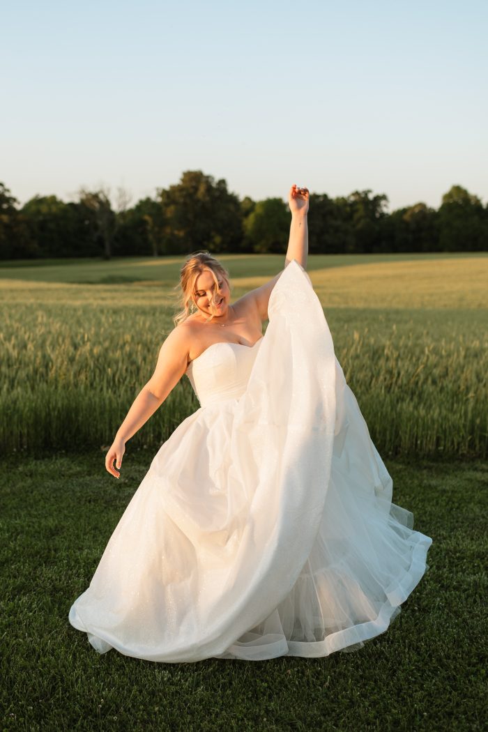 Bride wearing Anniston by Maggie Sottero before her wedding dress preservation