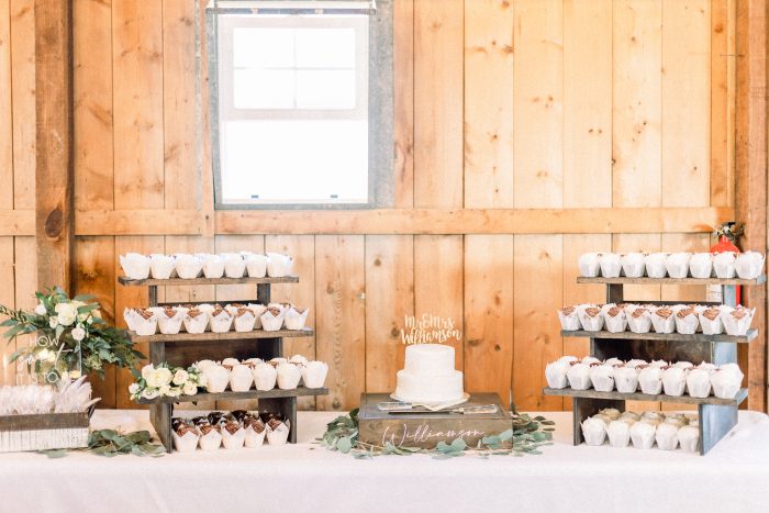 Photo Of Wedding Cake And Cupcakes