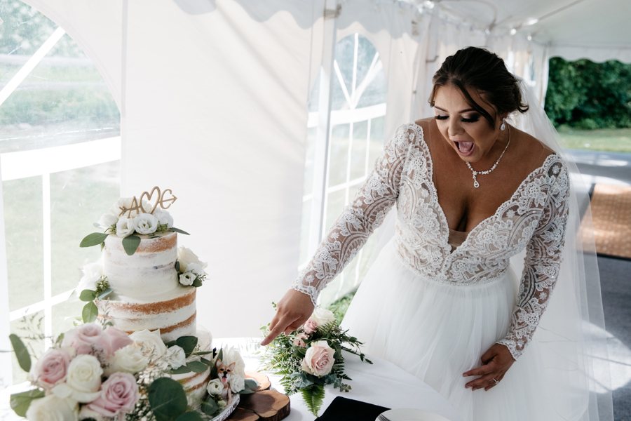 Bride In Mallory Dawn With Floral Spring Wedding Cake