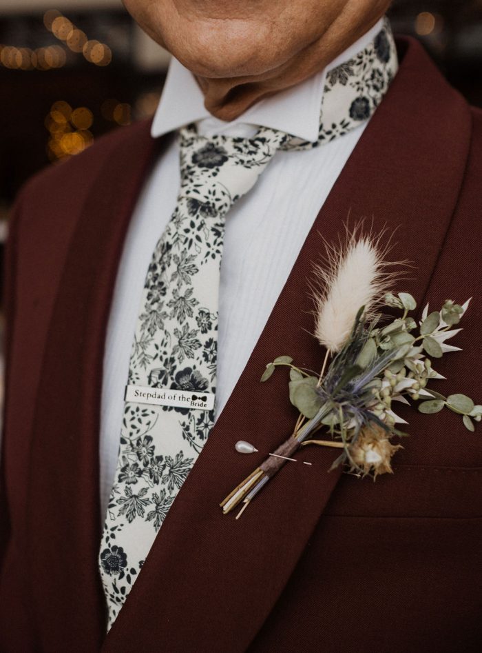 Groom in Maroon Suit