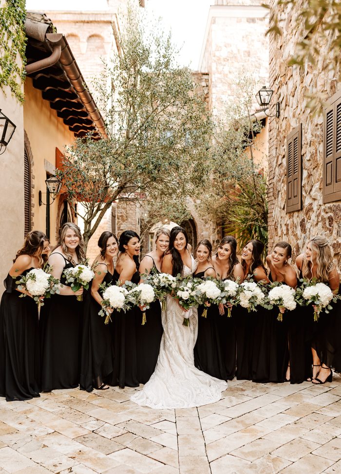 Bride In Lace Wedding Dress Called Roxanne By Sottero And Midgley With Bridesmaids In Black