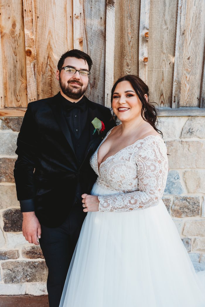 Bride In Lace Wedding Dress Called Mallory Dawn By Maggie Sottero With Groom In Black Suit