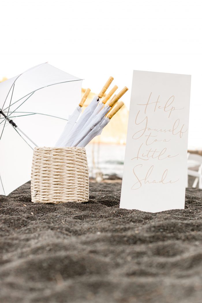 Umbrellas and Parasols to Shade Guests from Sun at Outdoor Beach Wedding