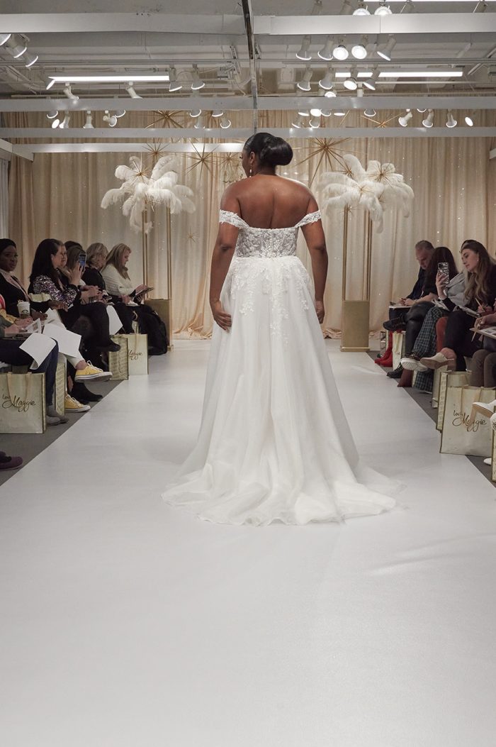 Model Liris Crosse Wearing Off-The-Shoulder Wedding Gown Called Ainsleigh By Rebecca Ingram