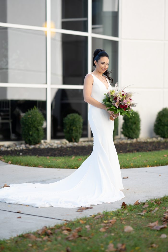 Bride In Crepe Fabric Wedding Dress Called Fernanda By Maggie Sottero