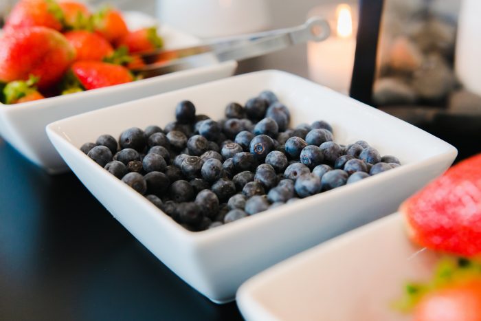 Blueberries And Strawberries On Buffet Table