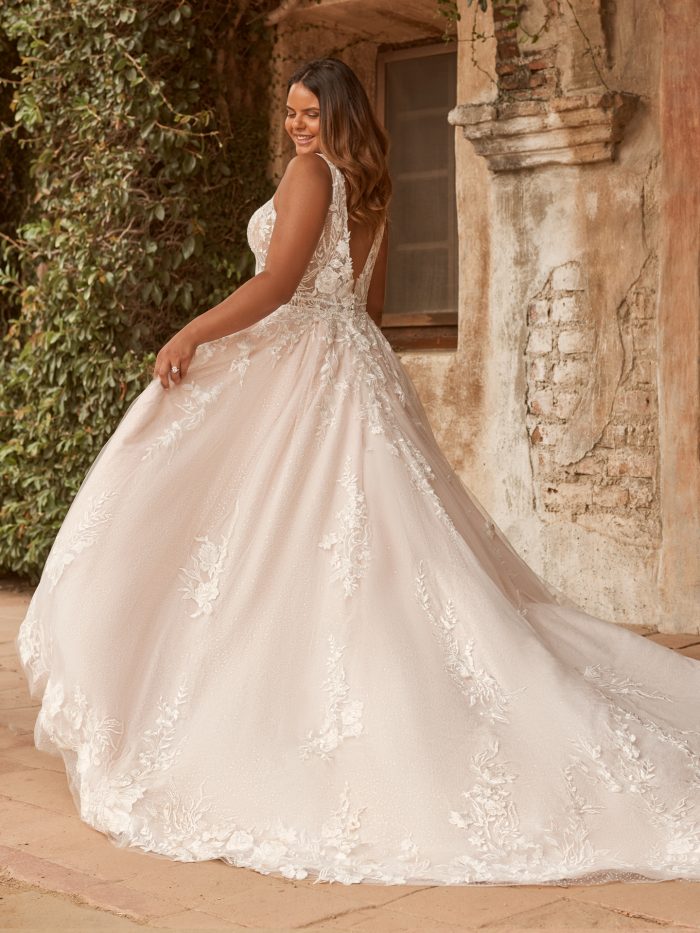 Wedding Dress Styles For Body Types For Brides With Pear Body Shapes With Bride Wearing A Gown With An Overskirt Called Albany By Maggie Sottero