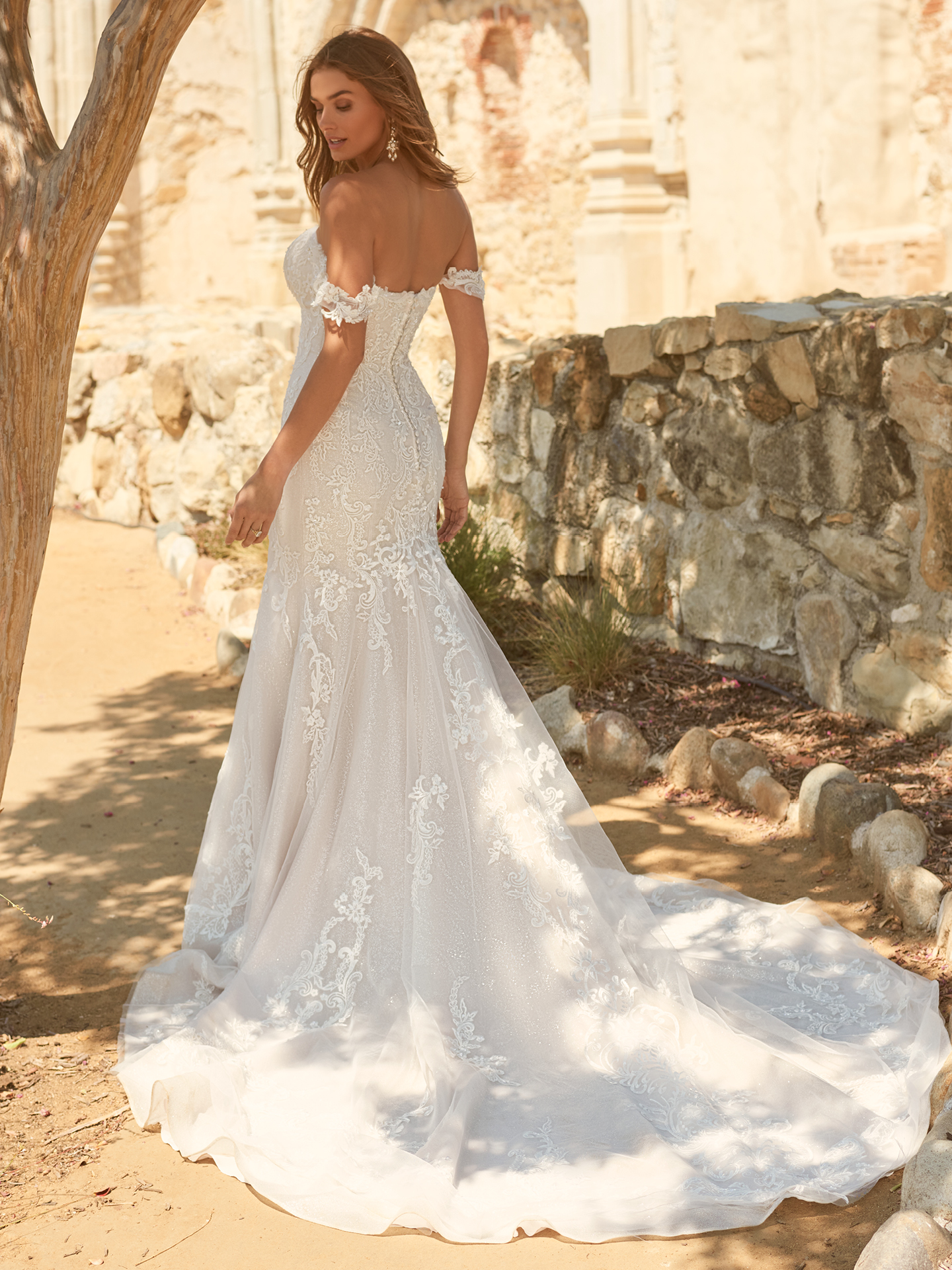 Bride In Strapless Fit-And-Flare Wedding Dress Called Frederique By Maggie Sottero