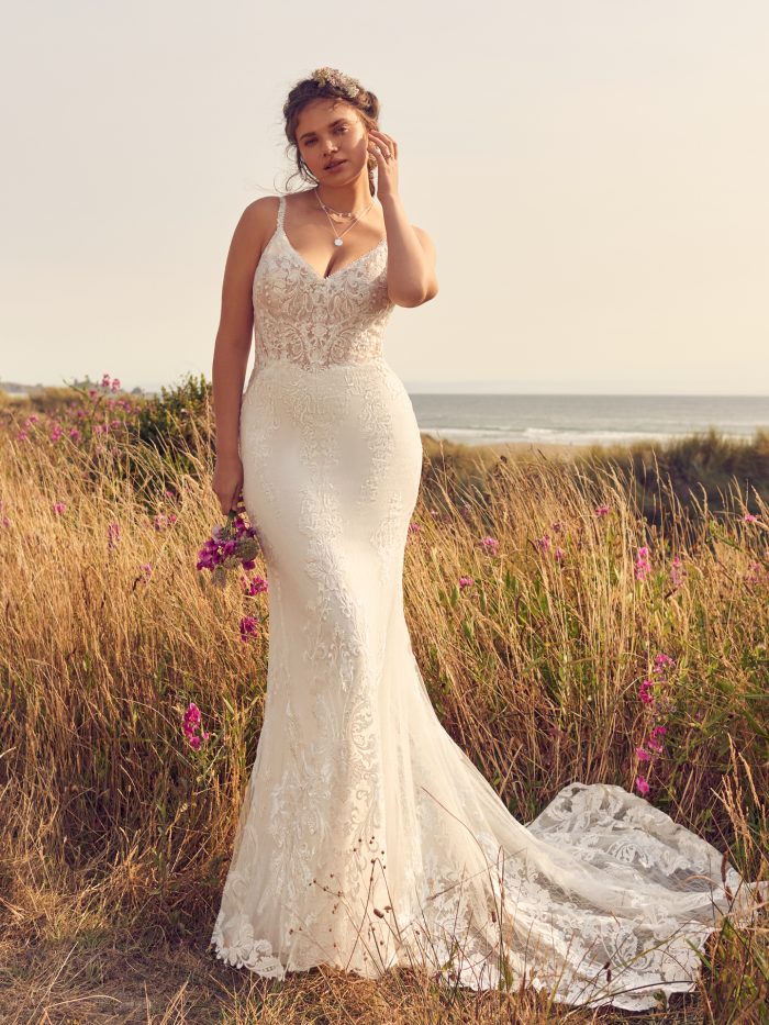 Bride Wearing Sexy Wedding Dresses With Cutouts Called Larkin By Rebecca Ingram