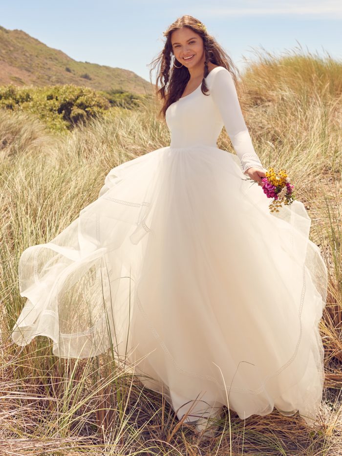 Bride In Modest Wedding Dress With Tulle Skirt Called Rosemary Leigh By Rebecca Ingram