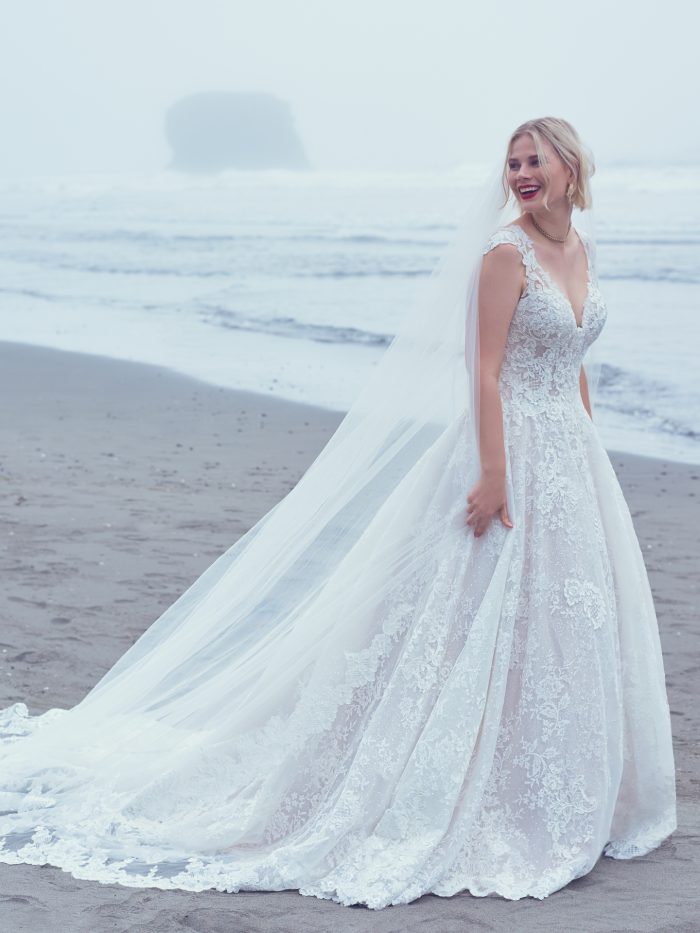 Bride Wearing A Detailed Ball Gown Wedding Dress With Unique Lace Called Kiernan By Sottero And Midgley 