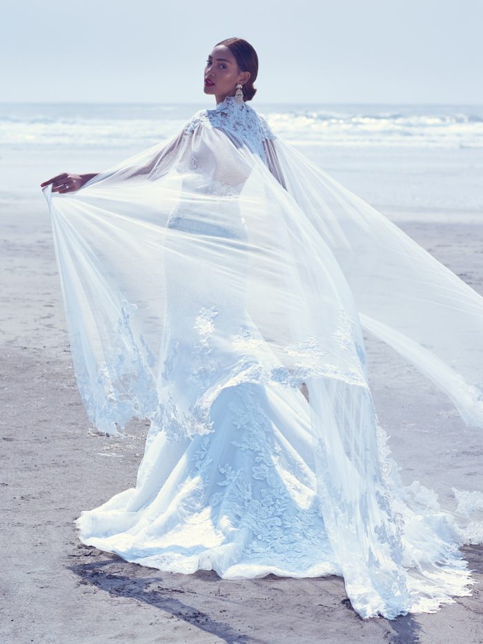 Bride In Wedding Dress Called Montgomery By Sottero And Midgley And Bridal Cape Called Carrington By Maggie Sottero