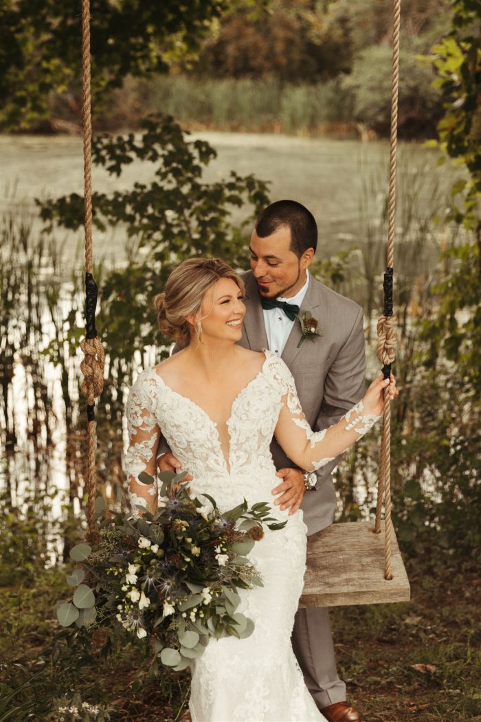 Bride In LongBride In Long Sleeve Wedding Dress Called Tuscany Royale By Maggie Sottero With Bouquet With Groom Sleeve Wedding Dress Called Tuscany Royale By Maggie Sottero With Bouquet