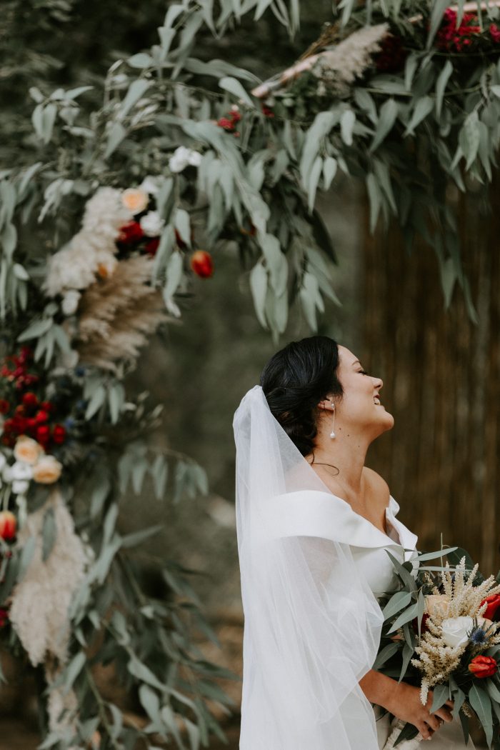 Bride wearing Josie by Rebecca Ingram during her wedding photography session