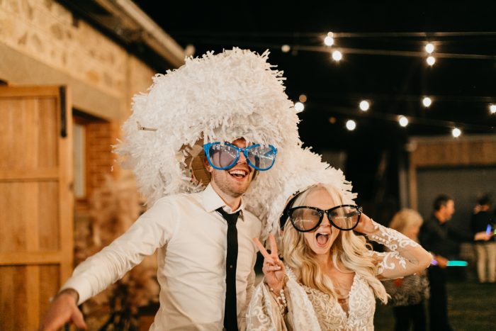 DIY Photobooth Of Groom And Bride Wearing A Dress Called Dakota By Sottero And Midgley 