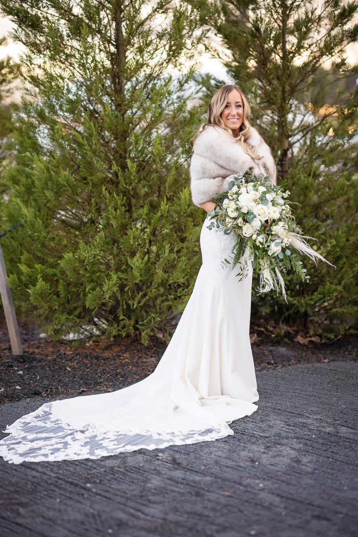 Bride wearing Nikki by Maggie Sottero during her wedding photography session