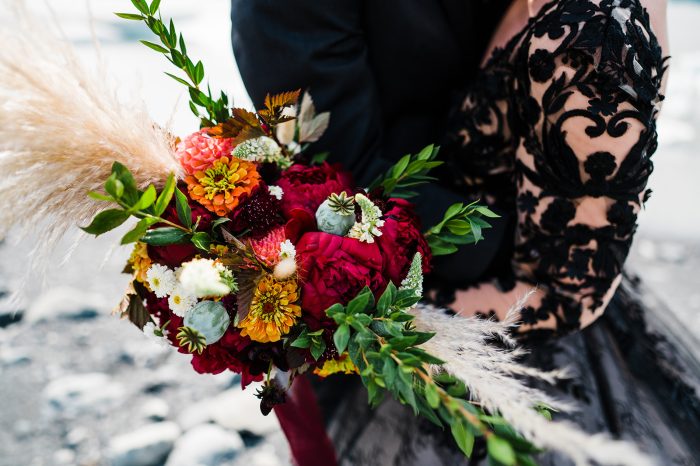 Bride HOlding Red FLowers