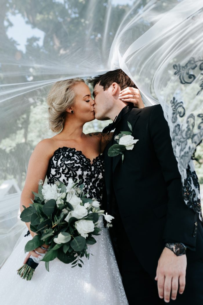 Good New Years Resolutions Of Being More Affectionate With Bride Wearing A Dress Called Tristyn By Sottero And Midgley 