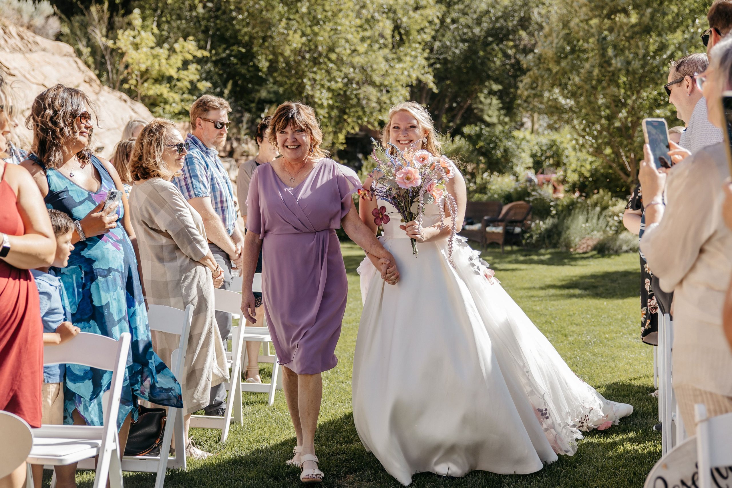 Bride In Satin Wedding Dress With Bridal Overskirt Called Selena By Maggie Sottero