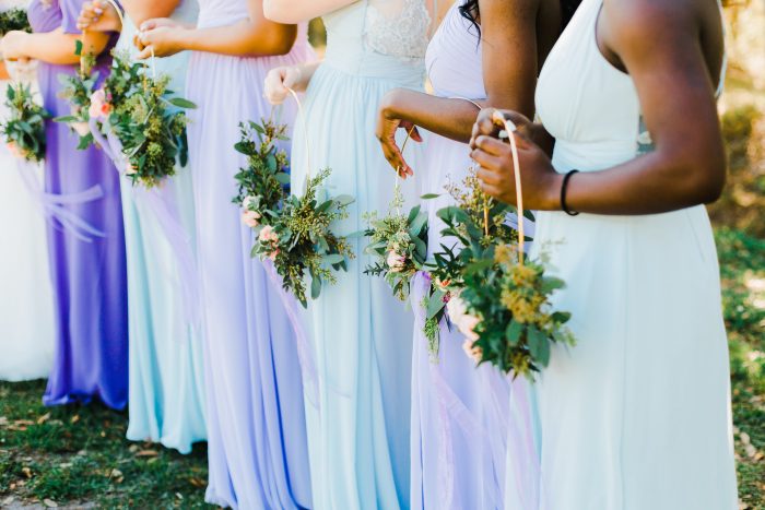 Pantone Color Of The Year Of Bridesmaids Wearing Purple Carrying Bouquets