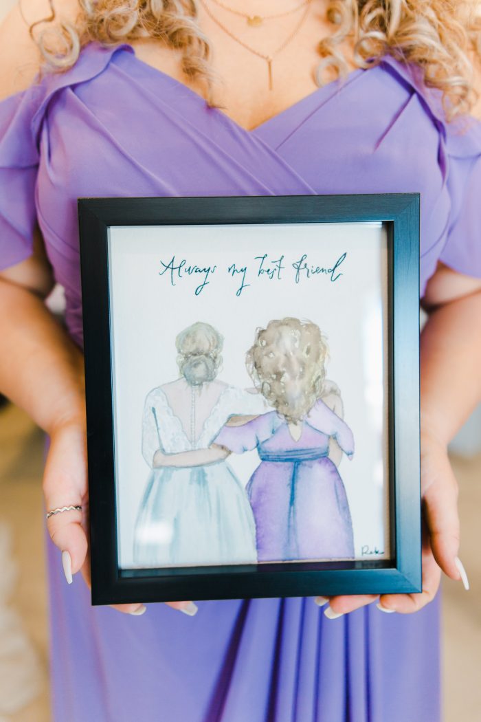 Pantone Color Of The Year 2022 With Bridesmaid Wearing Veri Peri Holding A Framed Drawing 