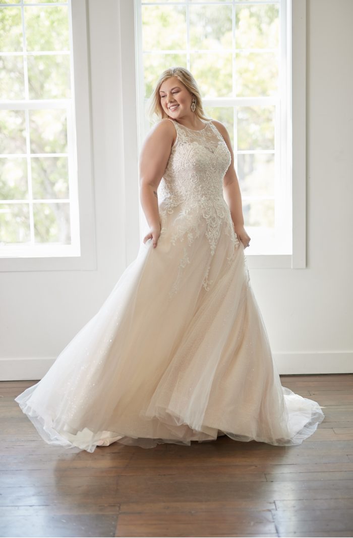 Plus Size Bride Wearing A Ball Gown With A High Neck Called Honor Marie By Rebecca Ingram