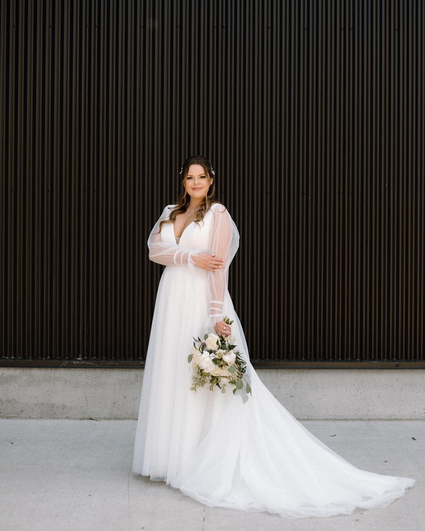 Bride In Tulle Wedding Dress With Bishop Sleeves Called Joanne By Rebecca Ingram