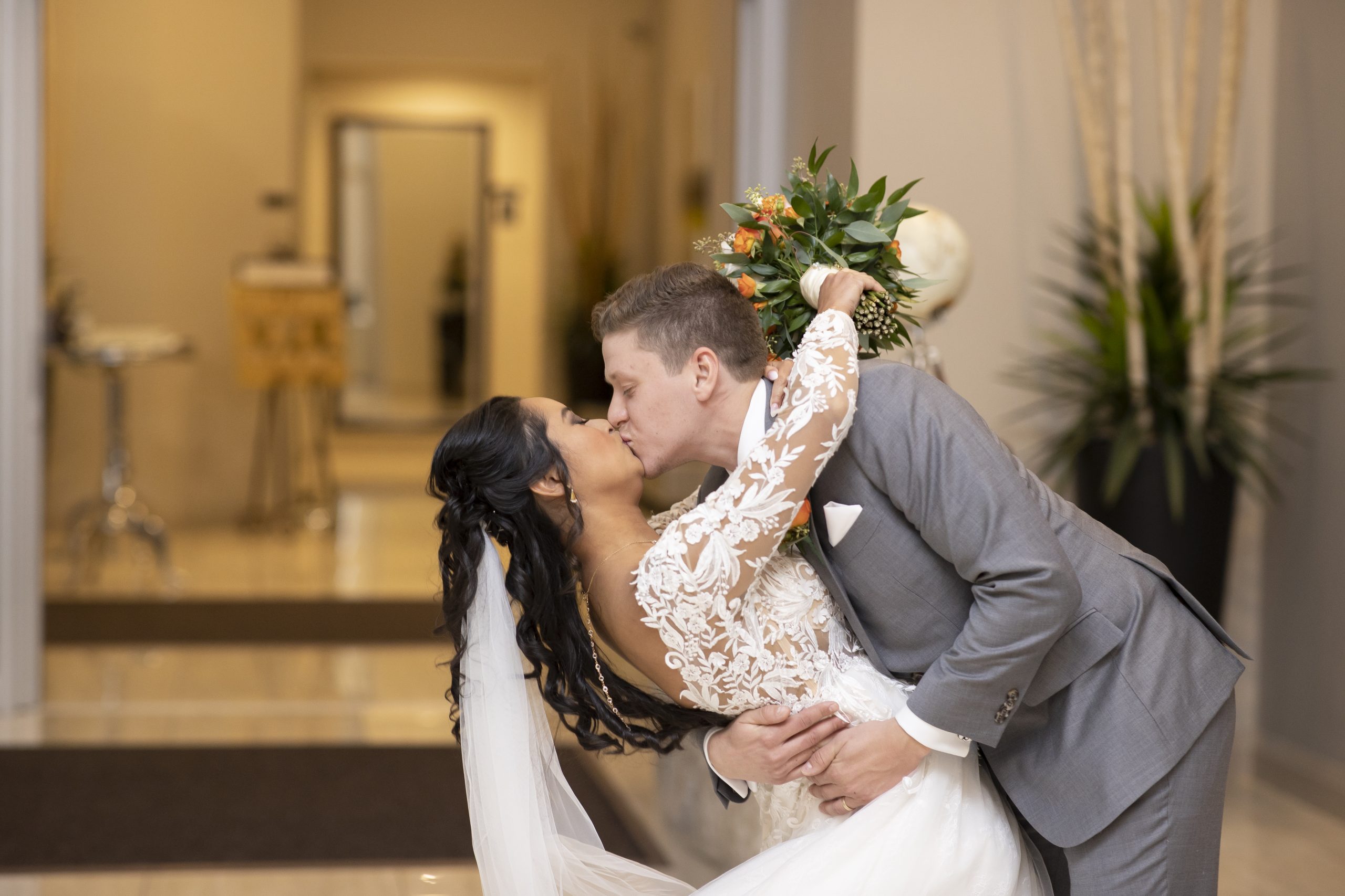 Bride In Lace Long Sleeve Wedding Dress Called Zander By Sottero And Midgley