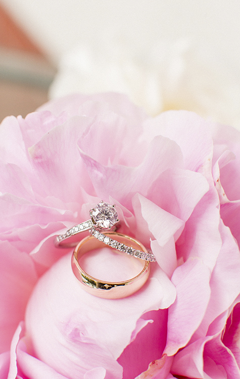Engagement Rings On A Pink Flower