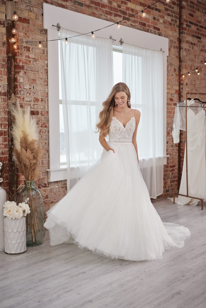 Bride Wearing A Romantic Wedding Dress Ball Gown Called Lorraine Lane By Rebecca Ingram